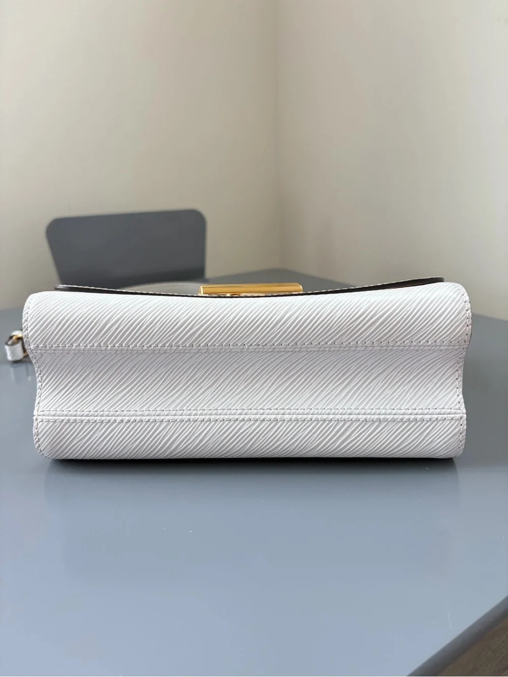 Louis Vuitton White Crossbody Bag with Gold Chain and LV Logo